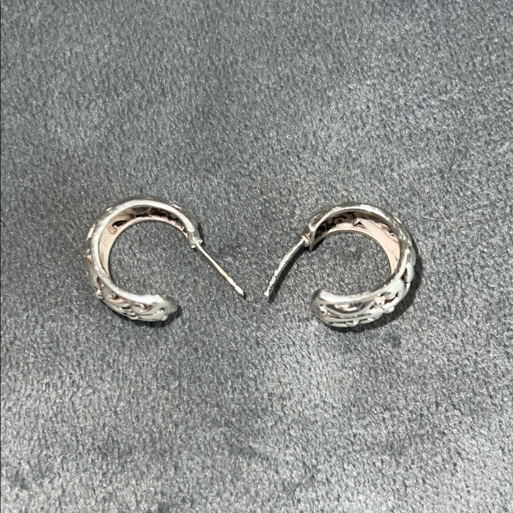Silver hoop earrings with filigree detail